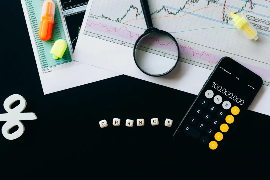 Analisis keuangan dengan grafik, kalkulator, dan data untuk menghitung BEP rupiah bisnis